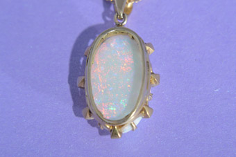 Gold Pendant With Opal